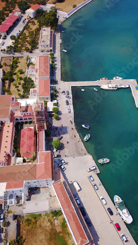 Aerial bird's eye view photo taken by drone from bay and iconic Monastery of Panormitis, Symi island, Dodecanese, Greece