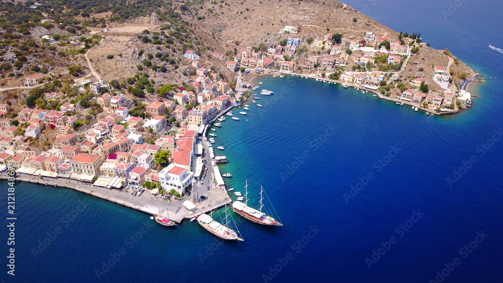 Aerial brid's eye photo taken by drone of Yalos, iconic port of Symi island, Dodecanese, Greece