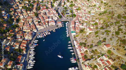 Aerial brid's eye photo taken by drone of Yalos, iconic port of Symi island, Dodecanese, Greece photo