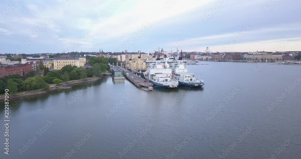 4K summer morning aerial video of Helsinki Katajanokka island anchoring area, water panorama and ships moored view in capital of Finland Suomi, northern Europe 4K summer morning aerial video of Helsinki Katajanokka island anchoring area, water panorama and ships moored view in capital of Finland Suomi, northern Europe