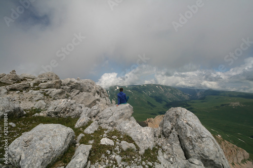 Tourist at the top of mount Oshten, Adygea.