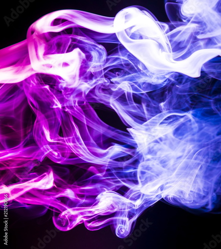 Colored smoke on black background