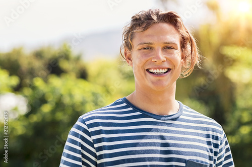 Smiling blonde guy outdoor