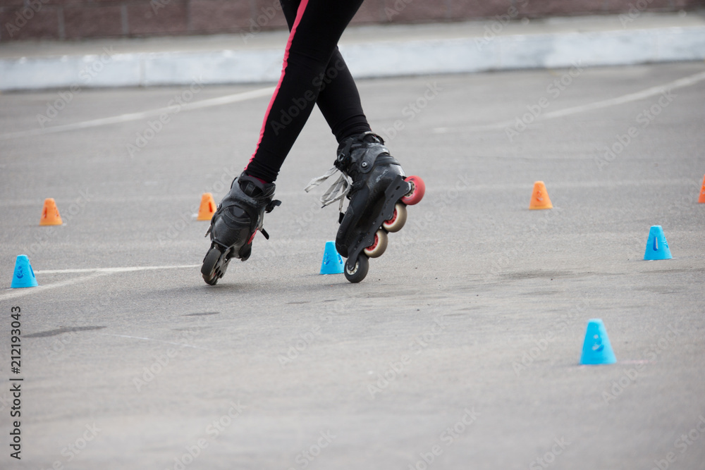 Obraz premium Competitions in roller sport.Roller skates and special chips