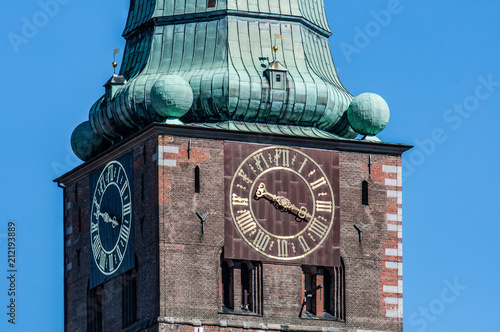 Lübeck St. Jacobi steeple in detail with clock and the Globes photo