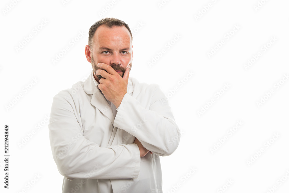 Portrait of male doctor showing thinking gesture Portrait of male doctor showing thinking gesture