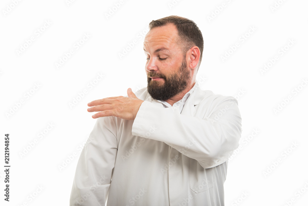 Portrait of male doctor cleaning coat from clothes scam Portrait of male doctor cleaning coat from clothes scam