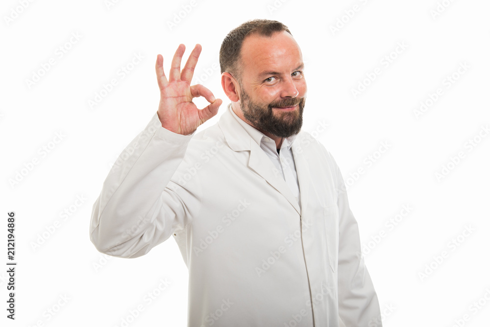 Portrait of male doctor showing ok gesture Portrait of male doctor showing ok gesture