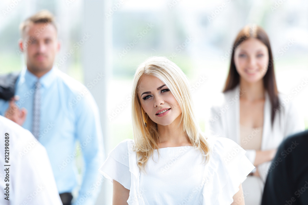 closeup of confident business woman on blurred background office closeup of confident business woman on blurred background office