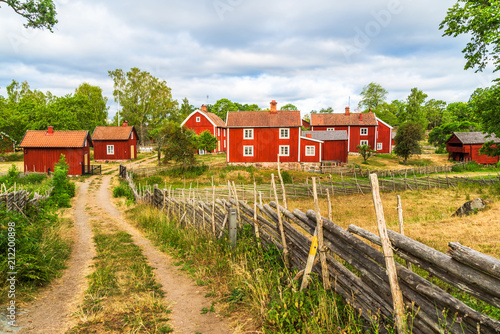 The historic village of Stensjo in Smaland, Sweden, as seen from a nearby country road. photo