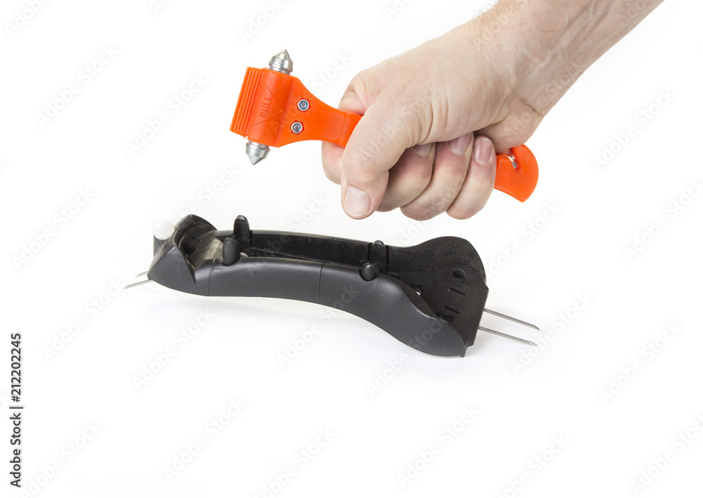 Safe hammer in the car on the white Safe hammer in the car on the white