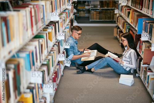 Students Studying In University Library