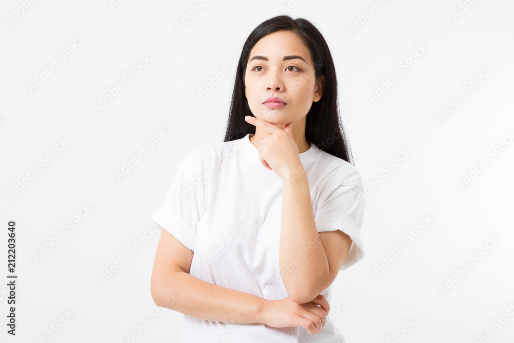 Thinking Young asian girl isolated on white background. Copy space. Mock up. Summer woman clothes blank template white t shirt.