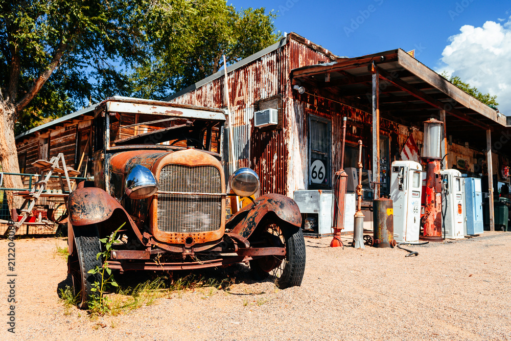 abandoned retro car in Route 66 gas station, Arizona, Usa