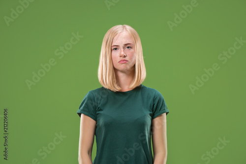 Beautiful woman looking sad and bewildered