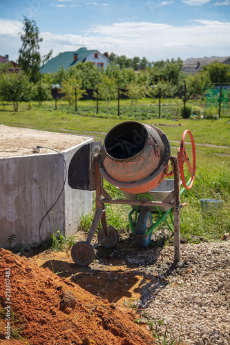 Wallpaper Mural Concrete mixer is at the construction site Torontodigital.ca