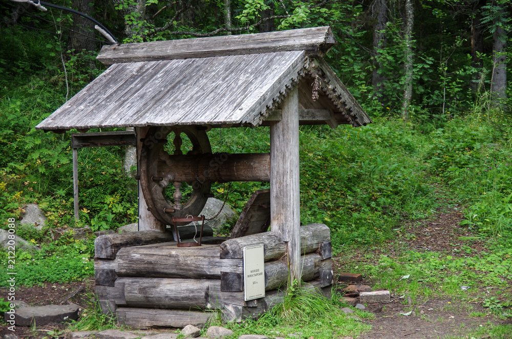 SOLOVKI, REPUBLIC OF KARELIA, RUSSIA - August, 2017: The old well on the Sekirnaya mountain on Solovki SOLOVKI, REPUBLIC OF KARELIA, RUSSIA - August, 2017: The old well on the Sekirnaya mountain on Solovki