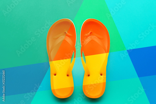 Flip flops, modern colorful flat lay composition