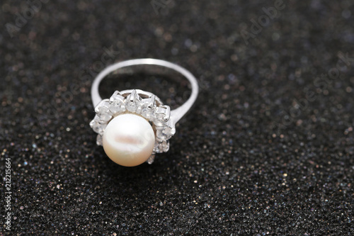 Pearl on diamond ring