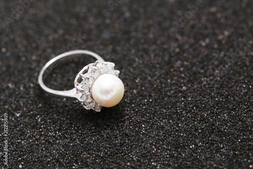 Pearl on diamond ring