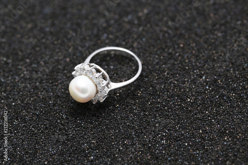 Pearl on diamond ring