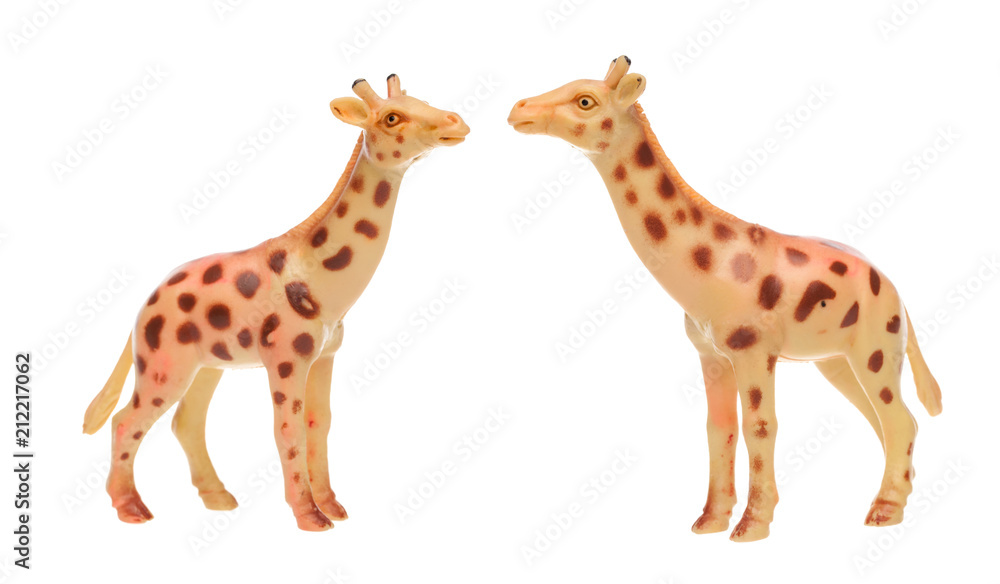Obraz premium Toy giraffe on white isolated background