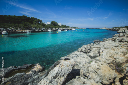 turquoise water in Spanish Menorca like in Caribbean, clear and perfect for swimming and bathing © limshae