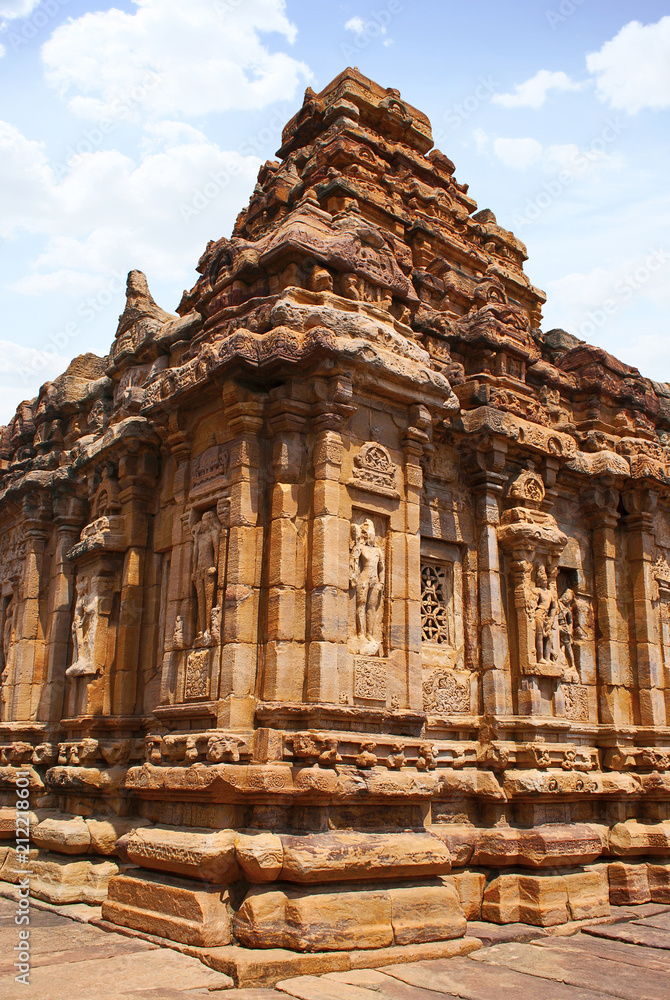 Exterior view of the sourhern walls. The Devakoshthas, Virupaksha temple, Pattadakal temple complex, Pattadakal, Karnataka. Southwest view. Western mukh-mandapa is seen on the right.