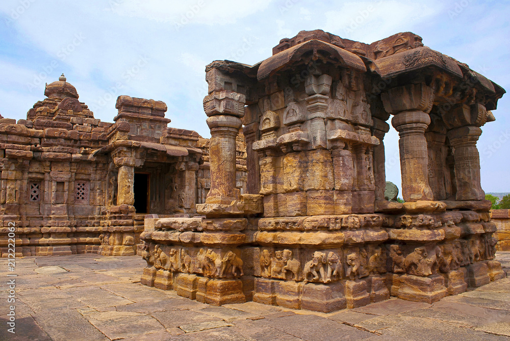 Open Nandi mandapa and the entrance to the Mallikarjuna Temple, Pattadakal temple complex, Pattadakal, Karnataka. The elephants in the adhishthana in different postures.