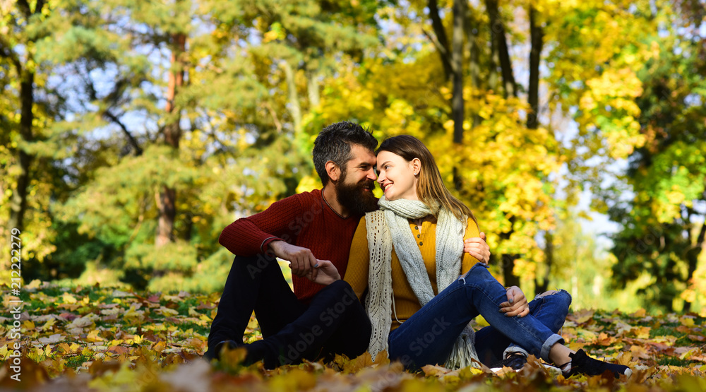Girl and bearded guy or happy lovers on date cuddle Girl and bearded guy or happy lovers on date cuddle