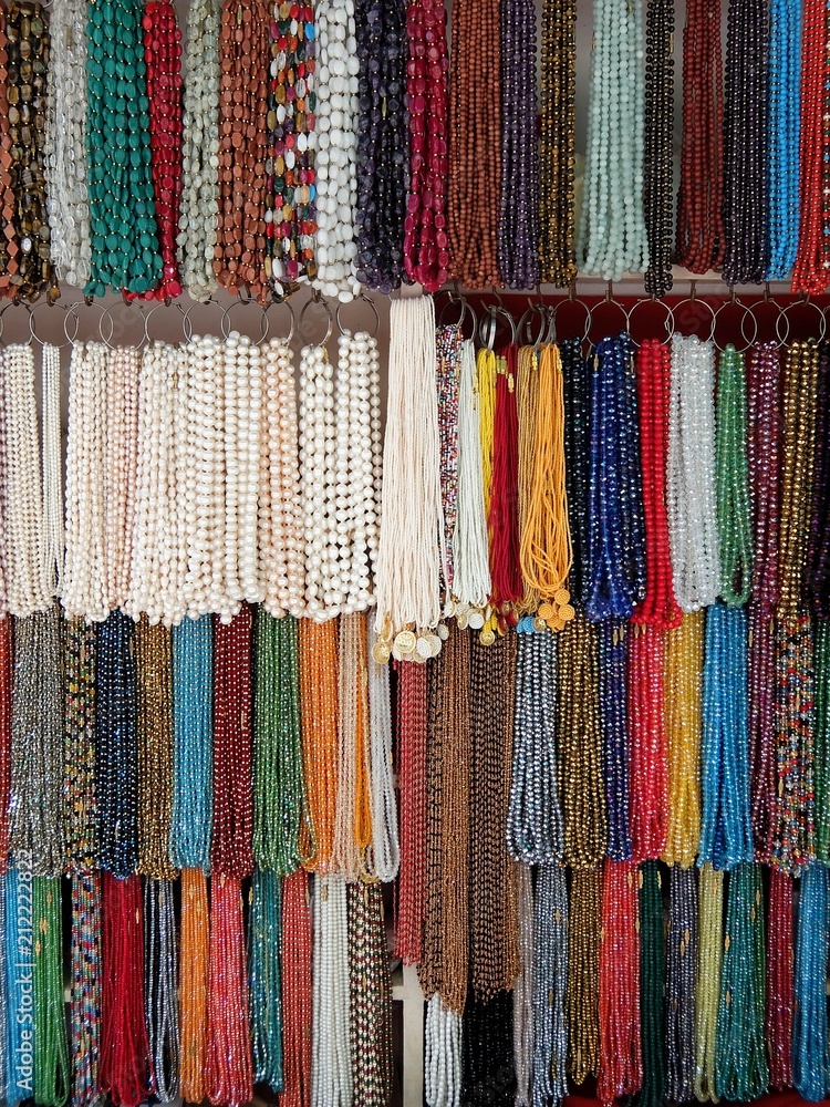 Glass and stone beads on the market