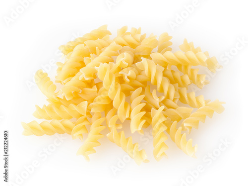 Heap of fusilli pasta isolated on white background