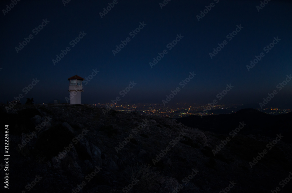 Night silhouette  fire lookout station Athens Greece city background