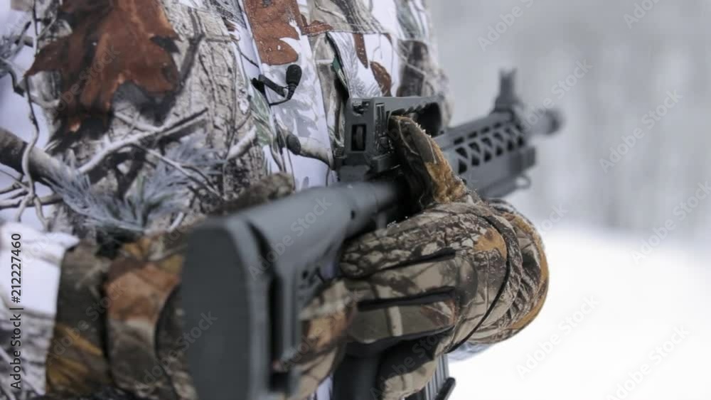 Close-up view of tactical gun. Man's hand hold a gun Close-up view of tactical gun. Man's hand hold a gun
