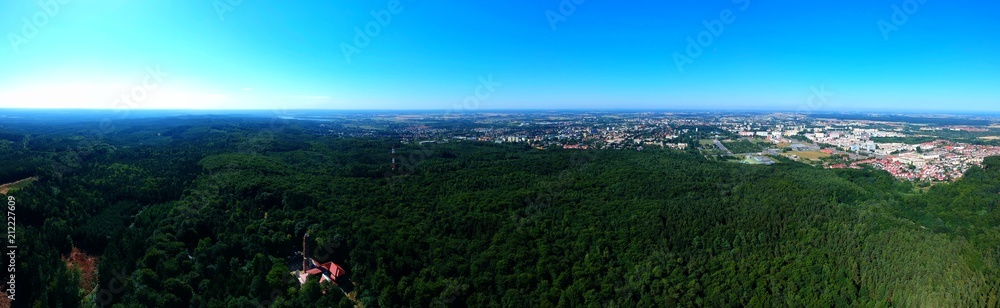 Panorama of aerial view on the city Koszalin and forest