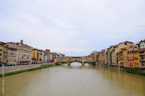 Ponte Vecchio known as Old Bridge - Famous medieval stone arch bridge over the Arno River, in Florence, Italy