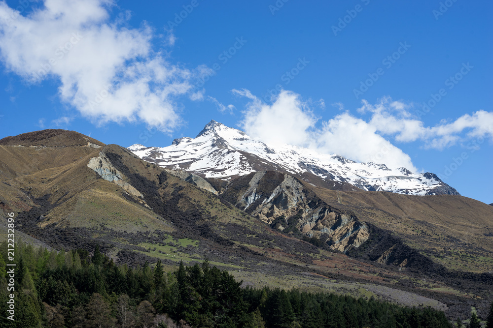Fototapeta premium scenery of snow mountains range in New Zealand with blue clear sky