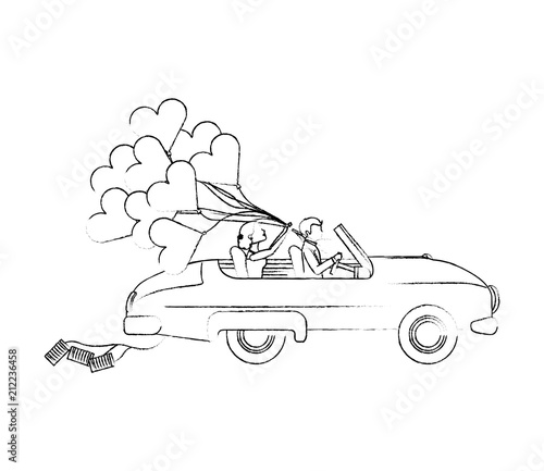 bride and groom couple in convertible car with balloons