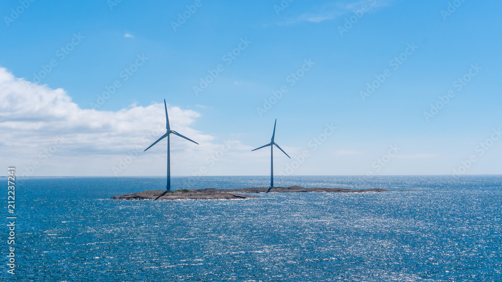 Wind mills at sea.