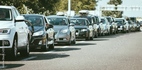 Billede på lærred Traffic jam on busy road cars in row