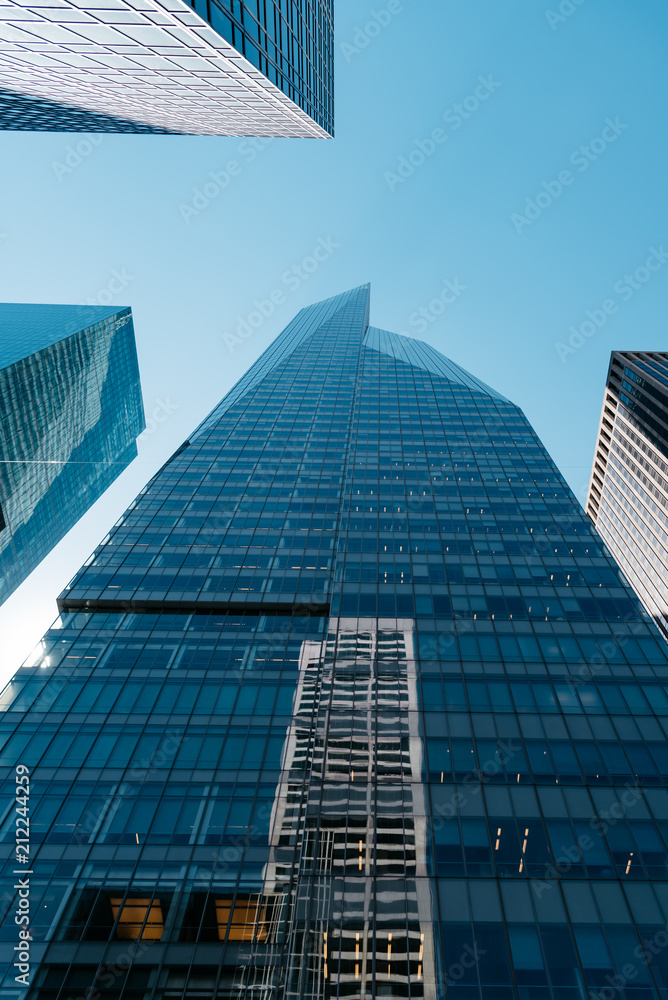 Low angle view of skyscrapers against sky in New York City