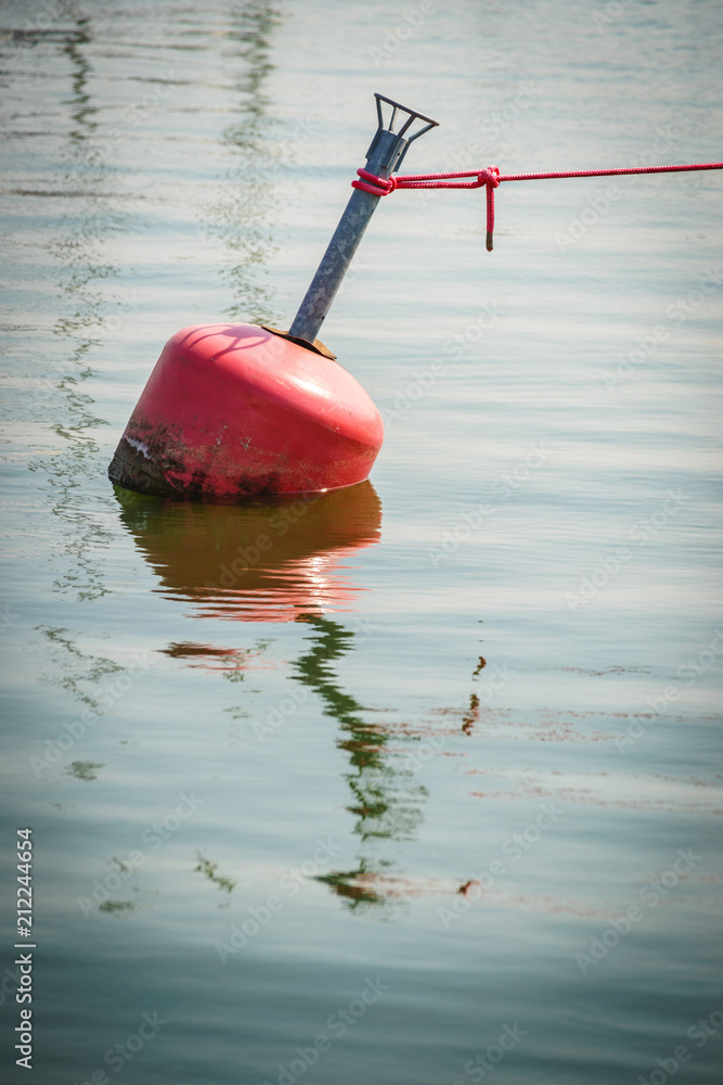 Mooring buoy on calm sea water