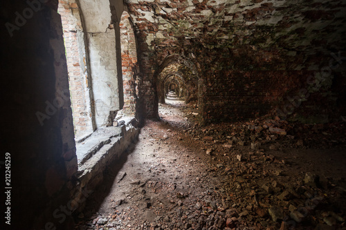 weathered dark corridor of old fortress