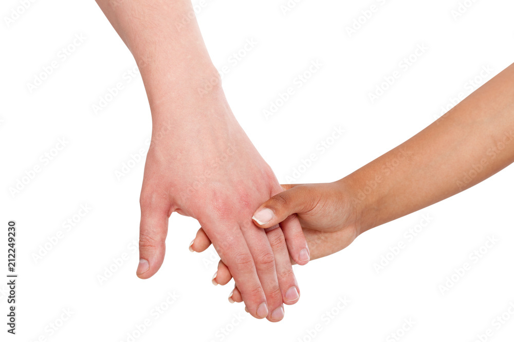 Holding hands couple of a mixed race on white background. Holding hands couple of a mixed race on white background.
