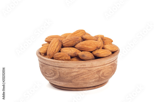 Almond nuts  in brown cup isolated on the white background