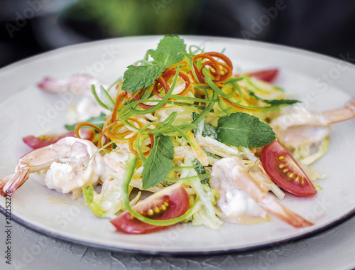 fresh prawn and green mango asian salad in vietnam