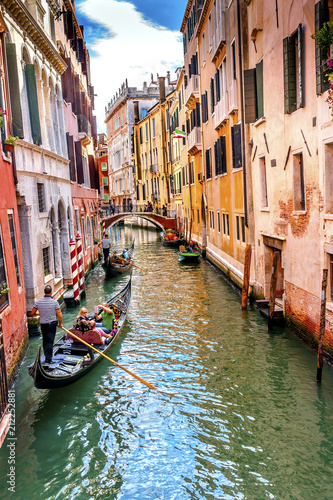 Gondola Touirists Colorful Canal Bridge Venice Italy photo