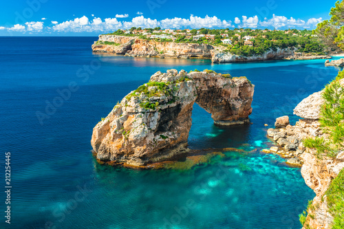 Majorca, view of natural rock arch Es Pontas at the coast of Majorca Spain Balearic Islands photo