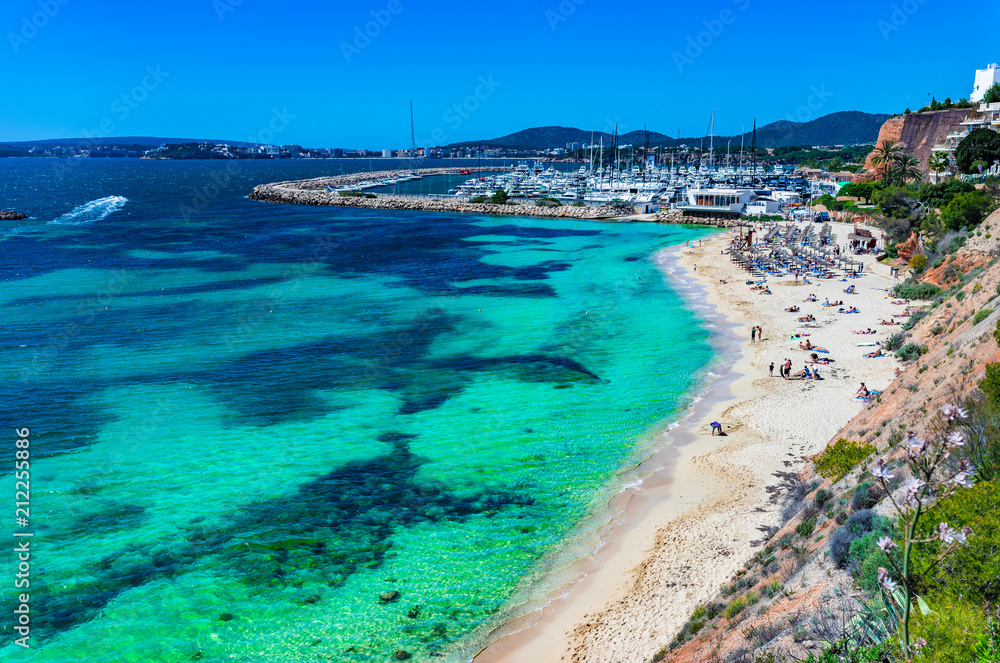 Beautiful view of sand beach and marina of Portals Nous, Mallorca island, Mediterranean Sea Spain