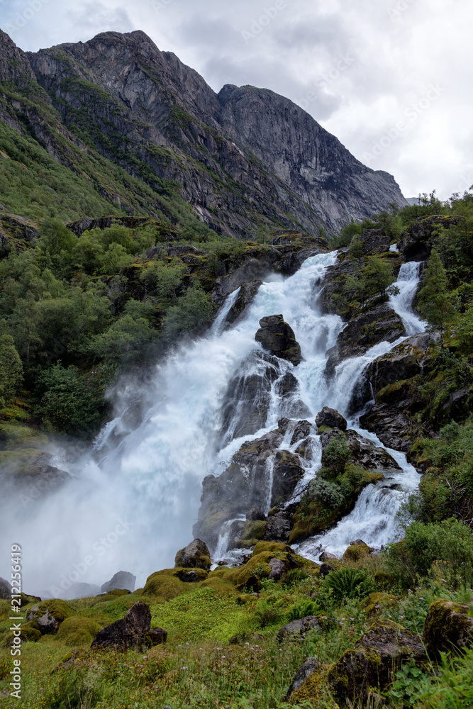 Fototapeta premium Small waterfall in Norway. Briksdalsbreen.